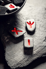 Runic stones with sign based on futhark alphabet