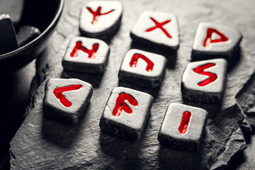 Poster - Black rune stones with red signs based on futhark alphabet