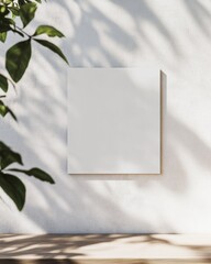 Aufkleber - Minimalistic Mockup of a Blank Frame on White Concrete Wall with Leaf Shadows