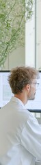 Aufkleber - Focused Male Scientist Analyzing Data in Modern Laboratory Setting