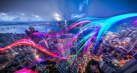 Poster - Aerial view of Hong Kong at night with illuminated skyscrapers and colorful streaks of light.