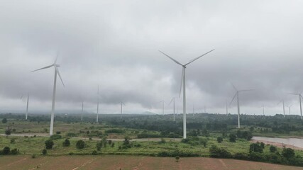 Wall Mural - large field with many wind turbines in the background
