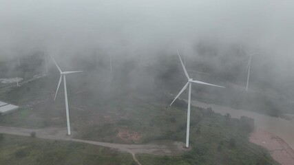 Wall Mural - large field with many wind turbines in the background