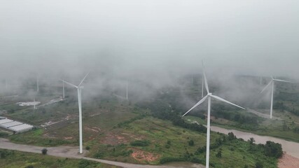 Wall Mural - large field with many wind turbines in the background