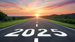 © Ayeen - 2025 written on highway road in the middle of empty asphalt road and beautiful blue sky. Concept for vision 2025.