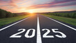 © Ayeen - 2025 written on highway road in the middle of empty asphalt road and beautiful blue sky. Concept for vision 2025.