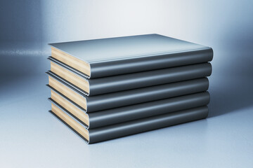 Poster - Creative row of stacked silver books on gray backdrop. Library, knowledge and education concept.