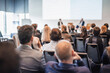 © kasto - Interview and round table discussion at business convention and presentation. Audience at the conference hall. Business and entrepreneurship symposium.