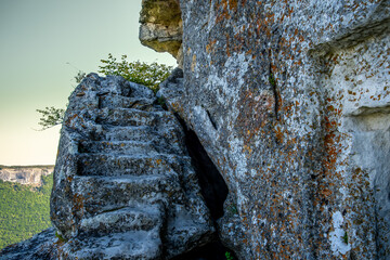 A stone staircase carved into the rock in ancient times.