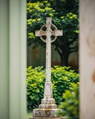 Old Cemetery Cross with Lush Green Surroundings.