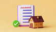 © Nim9ty  Pics - A miniature house next to an insurance form with a checkmark, symbolizing home insurance and protection.