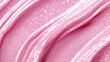 © KotBaton - Pink shimmering lip gloss texture background. Smudged cosmetic product smear. Makup swatch product sample.