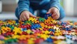 © Anastasiia - Child engaging in colorful puzzle play indoors on a sunny afternoon