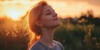 © StockUp - A woman basks in the sunlight, exuding peace and happiness in nature.
