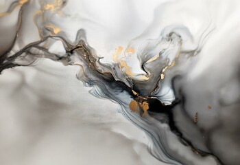 Abstract art with flowing black and gold paint on a white background.