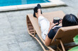 © wdnld - Relaxing by the Poolside with a Cup