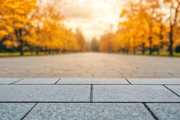 Poster - Empty stone surface is suitable for displaying products with a blurred autumn park background