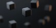 © Kamonwan - Floating black cubes in a dark background for modern designs and abstract concepts.