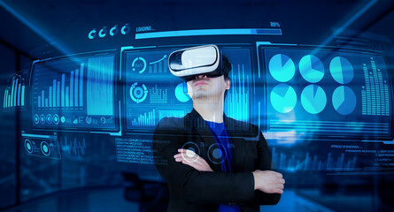 Poster - project manager with vr goggles looking financial chart and glowing blue light at office. skilled bu