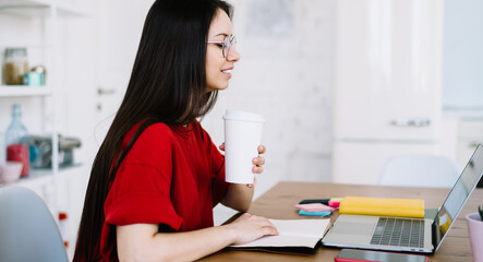 Female freelancer during coffee break