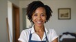 © Pixel Matrix - A portrait showcasing a self-assured African American woman ready for domestic tasks
