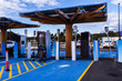© Austockphoto - Environmentally friendly electric vehicle charging stations powered by solar power