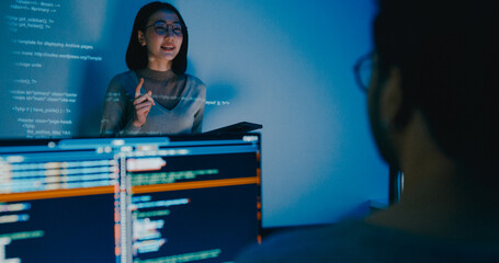 Group adult Asia female software developer mentor leader manager talk strategy plan to executive write prompt AI bot IT app program nomad, video game, designer, data center. Projecting slideshow code.