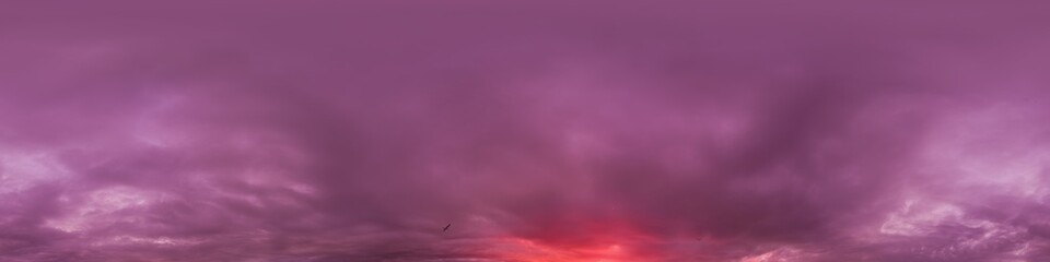 Wall Mural - Dramatic Sunset sky 360 panorama. Vibrant sky with bright glowing red pink Cumulus clouds. HDR 360 seamless spherical panorama. Sky dome for aerial drone panoramas. Climate and weather change.