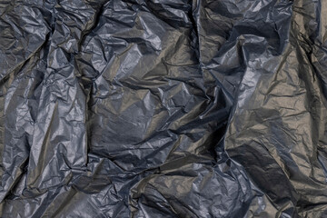 a piece of black soft paper for packaging goods and objects