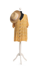 Wall Mural - Female mannequin with stylish yellow dress and straw hat isolated on white