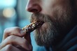 © Alexandr - Man with beard eating food