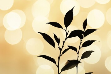 Poster - A delicate silhouette of a tea leaf stands out against a soft golden bokeh background, evoking calmness during twilight hours. Generative AI