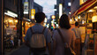 © bephoto - 夕暮れ時の日本の街並みと人々