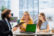 © DC Studio - Family receiving personalized financial plan from financial advisor using green screen laptop during meeting. Clients learn how to make profitable decisions from agent using mockup notebook