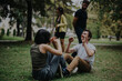 © qunica.com - A lively scene of students participating in an outdoor fitness class, guided by their professor. The background features lush greenery, emphasizing the natural setting. Students appear engaged in the