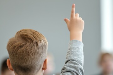 Canvas Print - A boy with a hand raised in the air