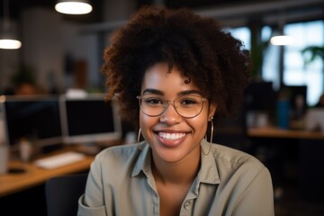 Wall Mural - Portrait of a smiling young African American hipster woman in office