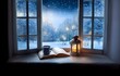 © joeycheung - A window view of a snowy winter landscape with a warm cup of tea, an open book, and a lantern on the windowsill.