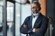 © k - Confident Senior Businessman Portrait in Modern Office