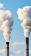© Todd's Studio - Close-up of two large smokestacks emitting thick white clouds against the blue sky, representing industrial air pollution.