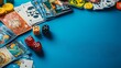 © Alpha - Artistic flat lay of modern board game elements like cards, tokens, and dice on a bright blue surface, with room for text to promote your message