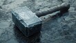 © anonymous - A large, weathered hammer rests on a textured surface, suggesting strength and craftsmanship.