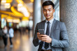 © Aekawat - Businessman Examines Phone, Strategizing Next Business Action