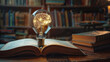 © AugusPic - a light bulb and human brain inside in open book on the table