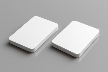 white blank business card mockup on a gray background, 3d rendering. two cards with rounded corners,