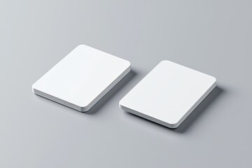 White blank business card mockup on a gray background, 3D rendering. Two cards with rounded corners, a mock-up template for design presentation of products or services