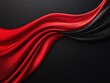 © ParinApril - Elegant flowing red and black satin fabric texture on a dark backdrop.