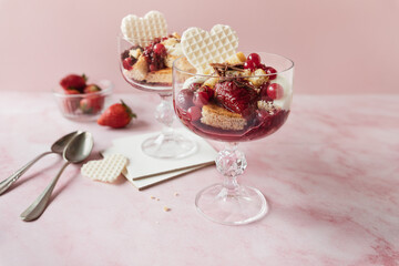 Strawberry creamy dessert in glasses, Valentine's Day fruit sweet food for two