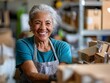 © Bussakon - Retiree Volunteering with a Warm Smile at a Community Center Giving Back and Staying Active