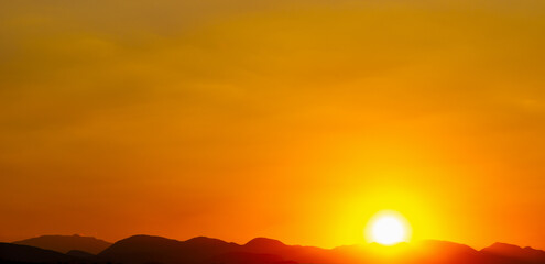 Wall Mural - Fiery orange sunset sky. Beautiful sky.